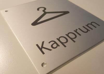 Hänvisningsskylt för kapprum